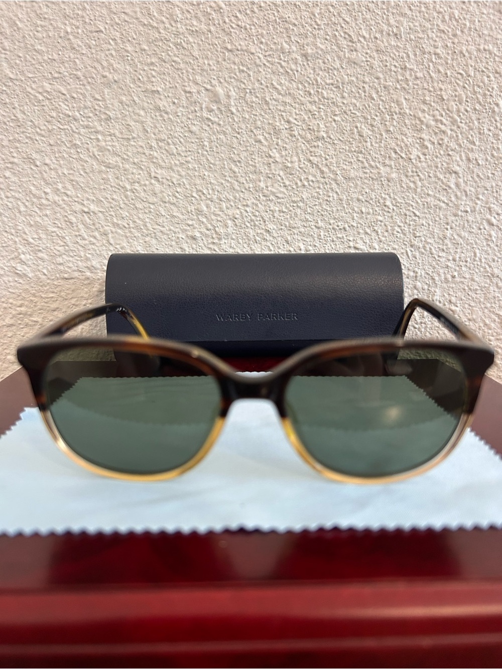 Warby Parker Tortoise Frame Sunglasses with Gold Trim and Green Lenses